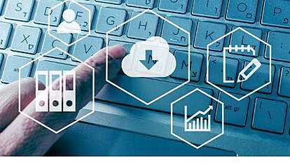 A keyboard with some icons about technology and systems.